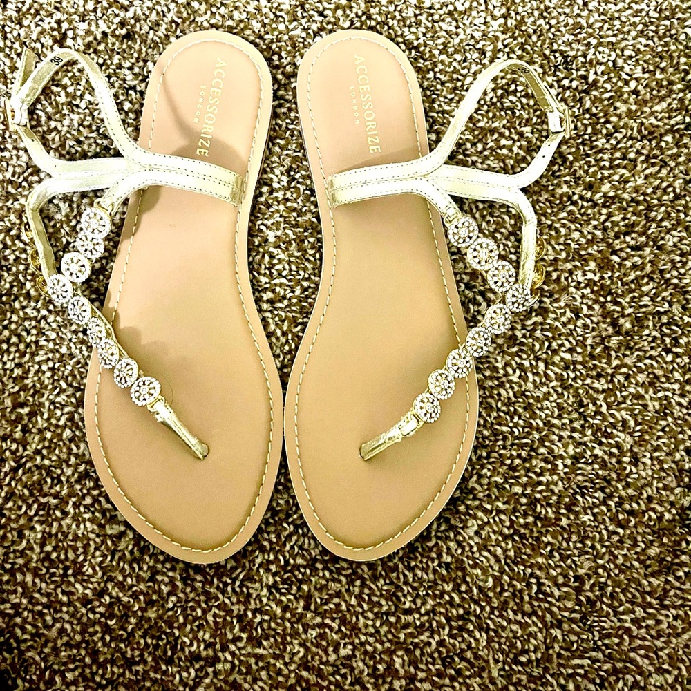 Accessorize thong sandals lightly used in light gold size UK 6 fits U.S 8.5